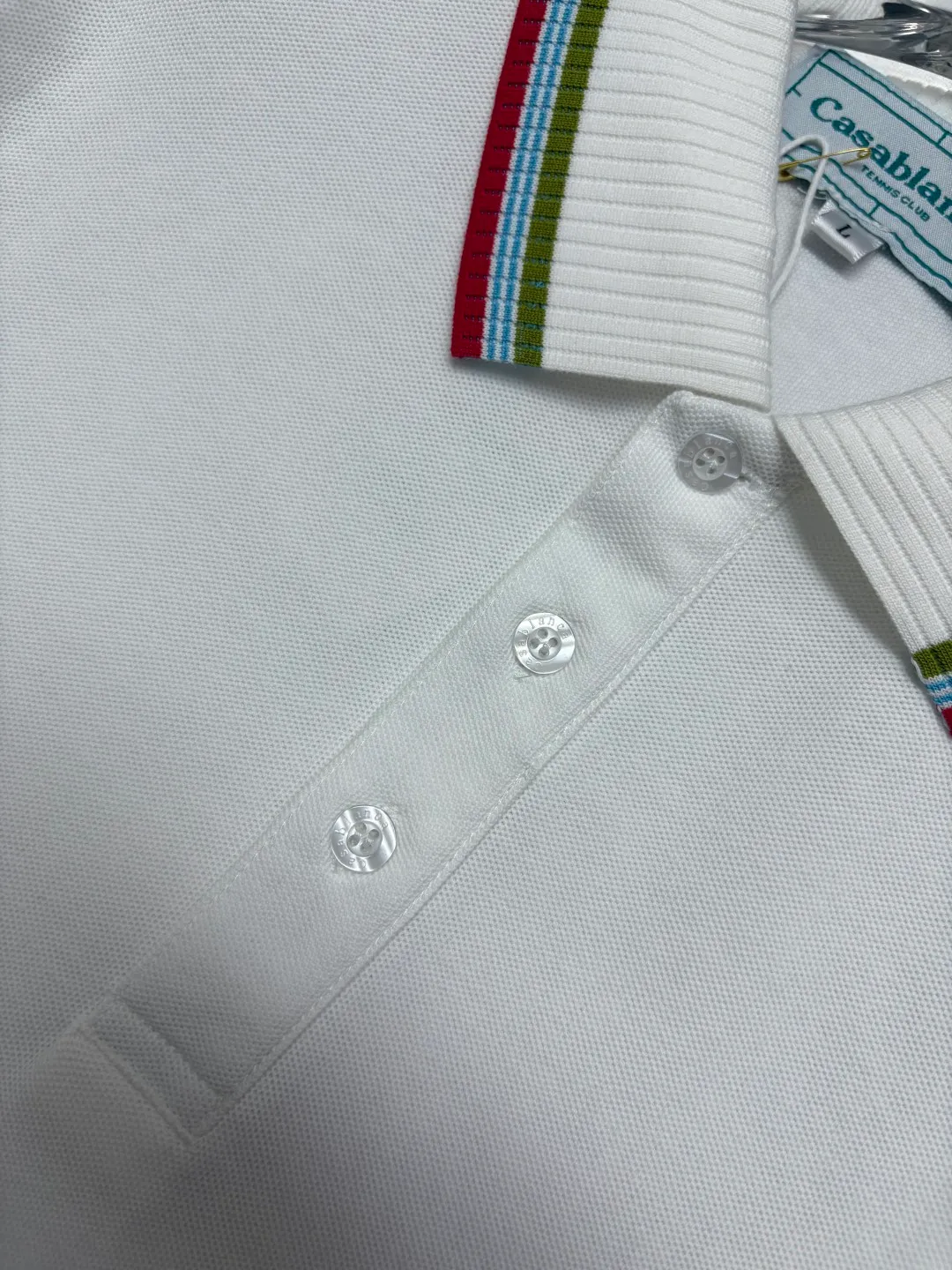 CASABLANCA New Arrival embroidered long-sleeved Polo shirt. Original fabric. Official Same Style. Made of pure cotton pique fabric, customized in the same vat. It feels very comfortable and smooth. The version is very wide and stylish. Produced by the first-line brand Factory. Imported Behringer embroidery machine. The embroidery is full and textured. The collar rib is woven with imported yarn. It will not deform after long-term wear. The most New Arrival style in spring and summer. Fashionable and individual. Super Versatile and good-looking. It is very suitable for both men and women. It is a must-have for everyone. Color: Black White Blue Size: M-3XL
